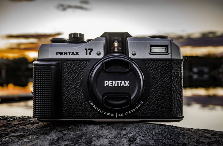 Maximum-aperture-priority kiểm soát độ sâu trường ảnh